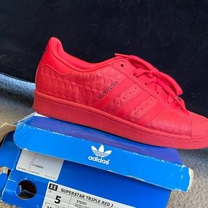 Red Adidas size 5